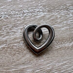 Retired James Avery Heart Strings charm. .925 silver.